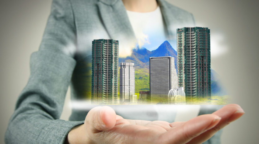 main faisant apparaître des immeubles en 3D