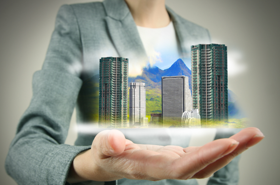 main faisant apparaître des immeubles en 3D
